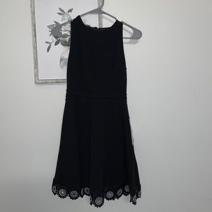 Black dress with white lace trim